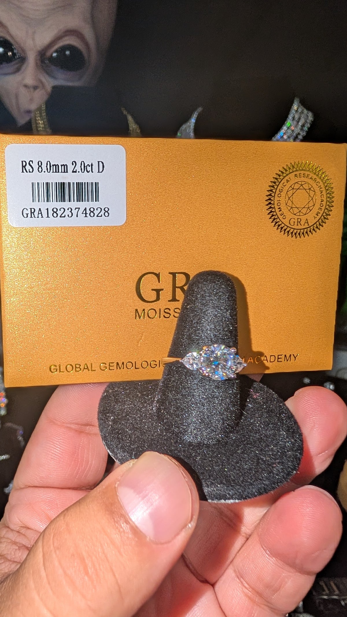 Plated 2ct Round Brilliant Center Moissanite With sparking heart shaped CZ side stones