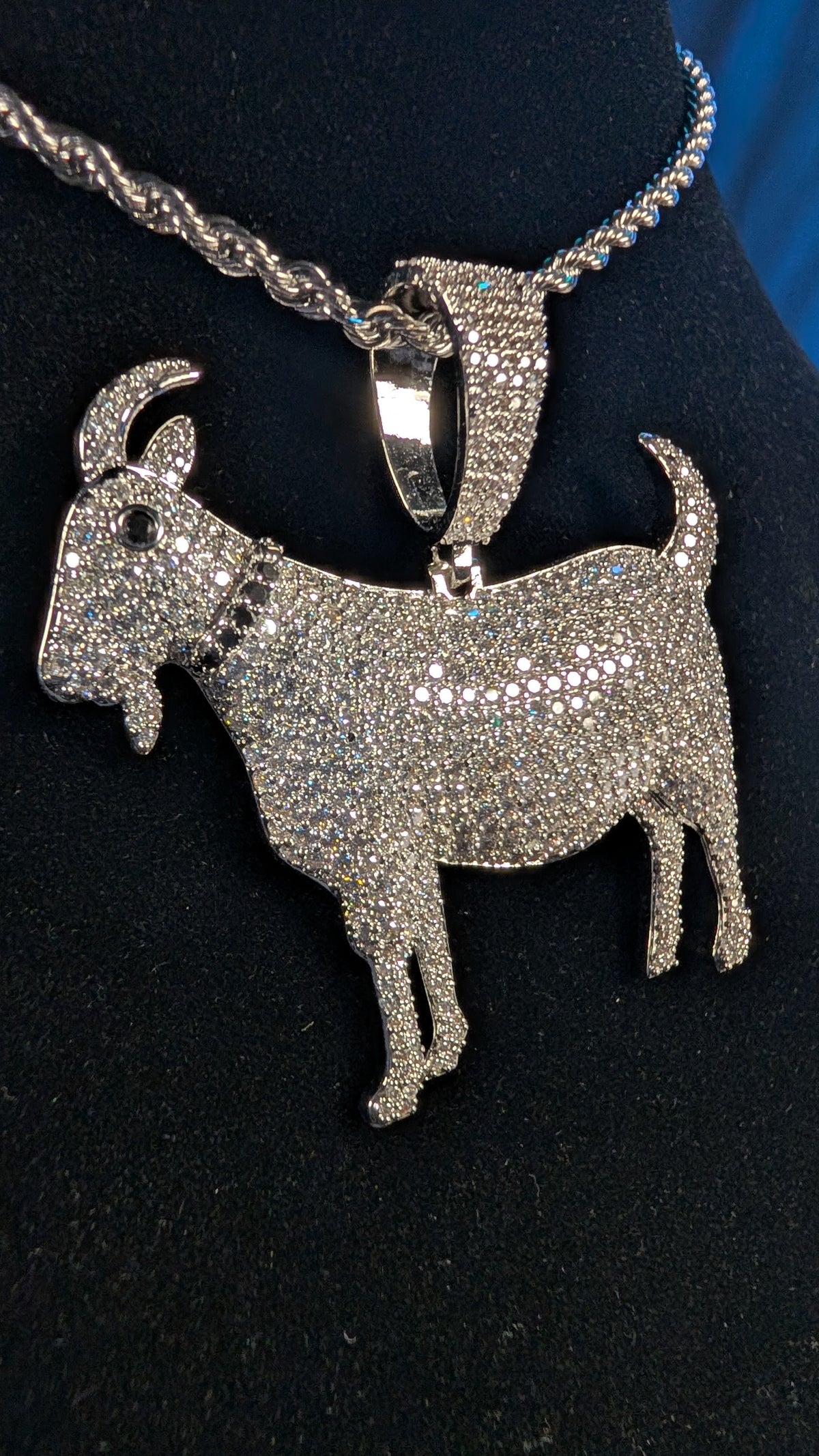Plated Cosmic G.O.A.T Moissanite Pendant on a 24 inch 3 mm Plated Rope Chain